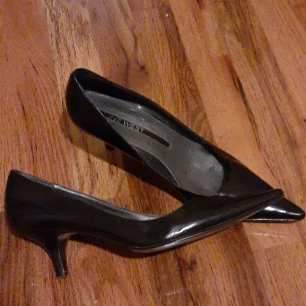 Genuine leather upper Nine West black heels.